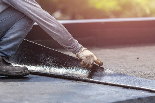 Professional Exterior Waterproofing technician working in Norwood, NY